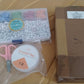 Neatly organized DIY bracelet making kit in a clear storage box