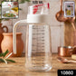 500ml glass oil dispenser with auto-flip cap and measuring markings, ideal for salad dressings and cooking oils