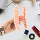 Fur coated hair clips showing plush texture and sturdy grip claws