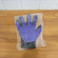 A real-time action shot of the pet deshedding glove removing loose fur from a pet.