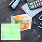 Side view of the compact stationery holder on a clean desk.