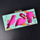 Set of six ice pop molds with handles, ready for making homemade frozen treats.
