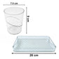 Close-up of transparent glass tumblers with tray