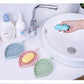 Durable plastic leaf soap holder with a clean, minimalist design.