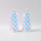 Pair of holographic decorative LED candle lights glowing warmly for home decor