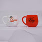 Detailed view of the King & Queen design on the couple mugs.