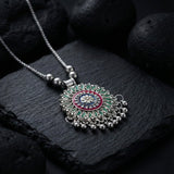 Antique silver-tone floral mandala pendant necklace with enamel accents and hanging ghungroo beads