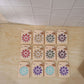 Selection of long coffin press-on nails exhibiting diverse 3D embellishment styles