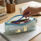 Cute cartoon printed transparent pencil pouch showcasing waterproof design for school use