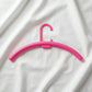 Plastic hanger rack for closet and laundry storage