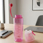 Pink sports water bottle with easy-carry loop attached