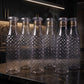 Set of transparent water bottles, perfect for kitchen and dining