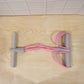 Portable resistance exerciser with foot pedal support for full body workouts