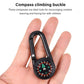 A person holding the mini compass with clip, demonstrating its portability and ease of handling.