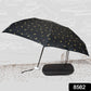 Comparison shot of the folded compact umbrella with a small water bottle, emphasizing its travel-friendly size.