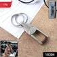 Close-up of durable metal alloy key holder with dual key rings and locking clip
