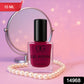 Vibrant burgundy gel nail paint bottle for professional manicures