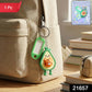 Close-up of cartoon character keychain charm with ID tag and metal key ring