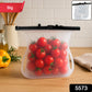 Close-up of a Reusable Silicone Food Storage Bag filled with fresh vegetables, highlighting its transparent material.