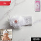 Close-up of elastic floral headband on infant, emphasizing gentle fit and floral design
