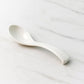 Plastic soup spoon used for noodles and broths