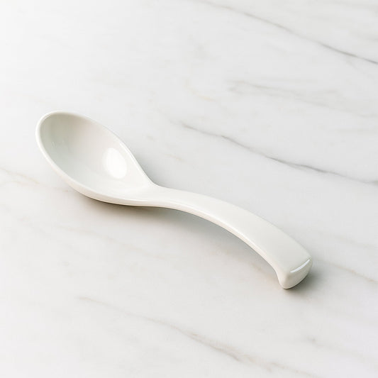 Plastic soup spoon used for noodles and broths