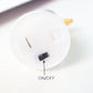 Close-up of LED star-shaped flameless tealight candle