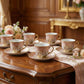 Elegant floral tea cup and saucer set with decorative gold rim