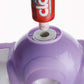 White automatic toothpaste dispenser and 4-slot toothbrush holder mounted on a wall.