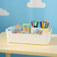 Stacked white plastic storage baskets in clean arrangement